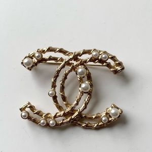 Authentic Chanel brooches with faux pearl